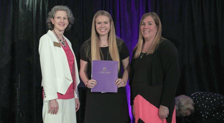 Whitney Boyd, the 2019 Round Table scholarship recipient, poses after receiving her award.